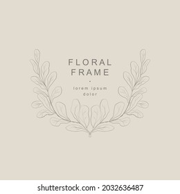 Hand drawn floral logo template. Elegant plant wreath frame with branch  with leaves. Botanical trendy vector illustration for labels, 
branding business identity, wedding invitation