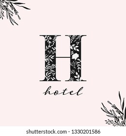 Hand drawn floral monogram logo. Flower letter design for hotel logo, boutique, photography studio, make up artist logo. Hand drawn logo. 