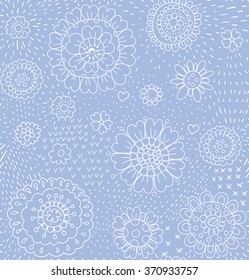Hand  drawn floral pattern with various flowers and doodle textures.