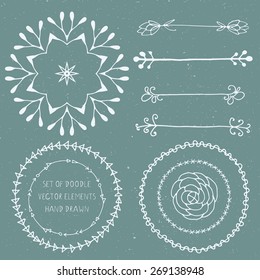 Hand drawn floral vector doodle set elements