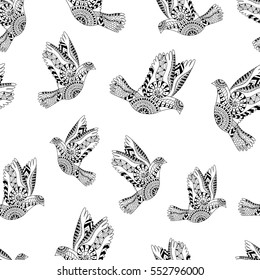 Hand drawn flying doves for adult anti stress colouring page. Seamless pattern. Ornamental background for Peace Day. Illustration in zentangle style. Monochrome variant. 