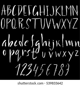 Hand drawn font made by dry brush strokes. Grunge style alphabet