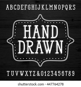 Hand drawn font on a wooden textured background. Vector alphabet - type letters and numbers.