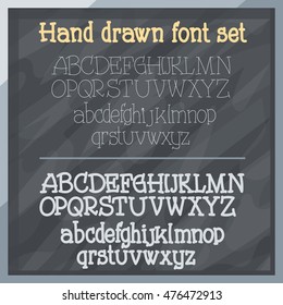 Hand drawn font set on board. Vector graphics