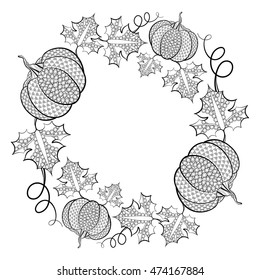 Hand drawn Frame of pumpkins and leaves in the round shape. Vector illustration in zentangle style. Sketch for adult anti stress coloring pages, tattoo or makhendra. Autumn collection