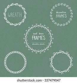 Hand drawn frames, wreaths, garland, laurels made in vector. Brushes set