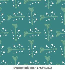 Hand drawn geometric arrows seamless pattern on green background. Tribal wallpaper. Doodle style. Decorative backdrop for fabric design, textile print, wrapping. Vector illustration