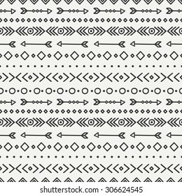 Hand drawn geometric ethnic seamless pattern. Wrapping paper. Scrapbook paper. Doodles style. Tiling. Tribal native vector illustration. Aztec background. Stylish ink graphic texture.