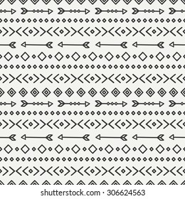 Hand drawn geometric ethnic seamless pattern. Wrapping paper. Scrapbook paper. Doodles style. Tiling. Tribal native vector illustration. Aztec background. Stylish ink graphic texture for design.