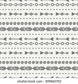 Hand drawn geometric ethnic seamless pattern. Wrapping paper. Scrapbook paper. Doodles style. Tiling. Tribal native vector illustration. Aztec background. Stylish ink graphic texture.
