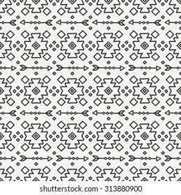 Hand drawn geometric ethnic seamless pattern. Wrapping paper. Scrapbook paper. Doodles style. Tiling. Tribal native vector illustration. Aztec background. Stylish ink graphic texture.