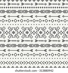 Hand drawn geometric ethnic seamless pattern. Wrapping paper. Scrapbook paper. Doodles style. Tiling. Tribal native vector illustration. Aztec background. Stylish ink graphic texture.