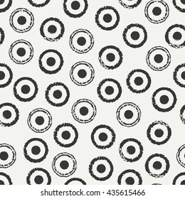 Hand drawn geometric seamless ink polka dot pattern. Wrapping paper. Abstract vector background. Round brush strokes. Casual polka dot texture. Doodle. Dry brush. Rough edges ink illustration.