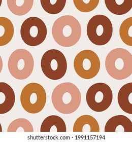 Hand drawn geometric seamless pattern in earthy colors. Contemporary background with circles for web design, prints, textile, wrapping paper. Abstract modern vector pattern with shapes. Vector graphic