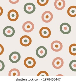 Hand drawn geometric seamless pattern in earthy colors. Contemporary background with circles for web design, prints, textile, wrapping paper. Abstract modern vector pattern with shapes. Vector graphic