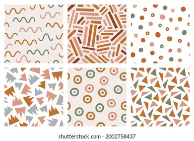 Hand drawn geometric seamless patterns in earthy colors. Set of abstract modern repeatable backgrounds for wrapping paper, textile and prints. Contemporary vector ornament with geometrical shapes