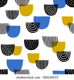 Hand drawn geometric shapes seamless repeating pattern in black, blue, mustard yellow and white.