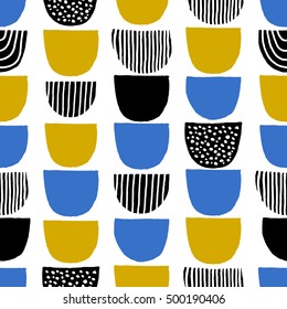 Hand drawn geometric shapes seamless repeating pattern in black, blue, mustard yellow and white.