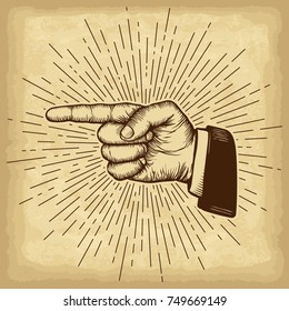 Hand drawn hand gesture. Forefinger on old craft paper texture background. Linear vintage style sun rays. Template for your design works. Engraved style vector illustration.