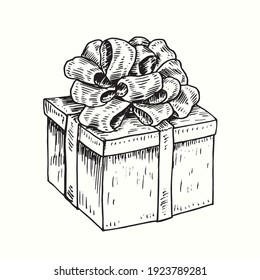 Hand drawn gift box with ribbon on top. Ink black and white drawing. Vector illustration
