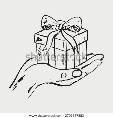 Hand drawn gift box with ribbon held in open hand. Vector sketch illustration in vintage crayon charcoal style. Holiday Celebration, happy birthday gift giving