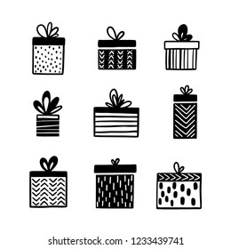 Hand drawn gift boxes set. Scandinavian style simple doodle drawings for prints patterns decoration needs. Vector illustration.
