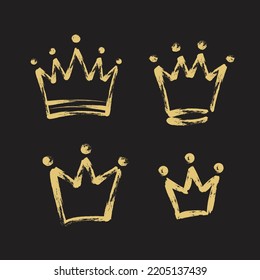 Hand drawn gold crowns set in grunge sketch style on black background