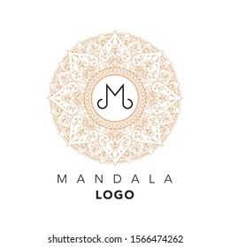 Hand drawn gold mandala logo