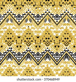 Hand drawn golden seamless pattern. Vector illustration for gold design. Ethnic motif. Zigzag and stripe line. Yellow and white colors. For invitation, web, textile, wallpaper, wrapping paper.