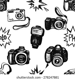 Hand drawn graphic black and white sketched flash, body, camera, digital, SLR. Set of modern photo items seamless pattern. Hatched line art sketch on white background 