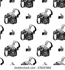 Hand drawn graphic black and white sketched digital and SLR. Set of modern photo items seamless pattern. Hatched line art sketch on white background 