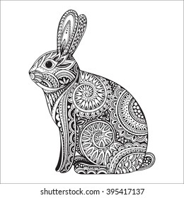 Hand drawn graphic ornate rabbit with ethnic floral doodle pattern.Vector illustration for coloring book, tattoo, print on t-shirt, bag. Isolated on a white background. 