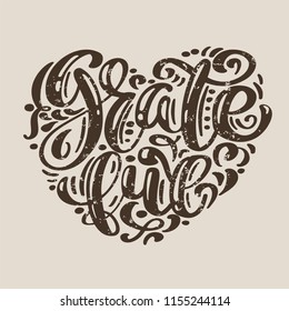 Hand drawn Grateful typography poster Happy Thanksgiving Day. Celebration lettering quotation for greeting card, postcard, event icon logo. Vector vintage calligraphy in the shape of a heart.