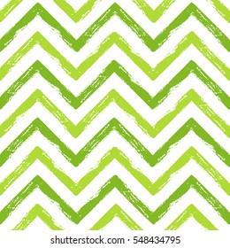 Hand drawn green ink abstract ZigZag striped seamless pattern. Vector grunge texture. Monochrome paint brush smears on white background.