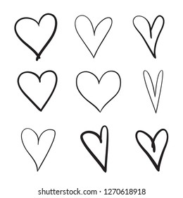 Hand drawn grunge hearts on isolated white background. Set of love signs. Unique image for design. Black and white illustration. Elements for design