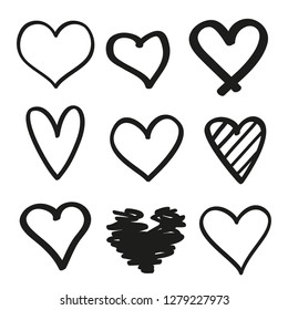 Hand drawn grunge hearts on isolated white background. Set of love signs. Unique image for design. Black and white illustration. Elements for design