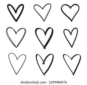 Hand drawn grunge hearts on isolated white background. Set of love signs. Unique image for design. Black and white illustration. Sketchy elements for design