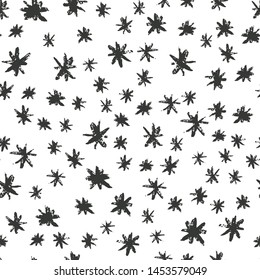 Hand drawn grunge stars seamless pattern. Black ink stains star wallpaper on white background. Vector illustration