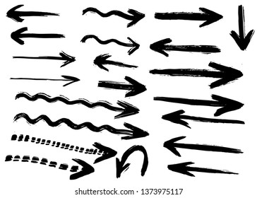 Hand drawn grunge vector arrows. Dry paint brush strokes