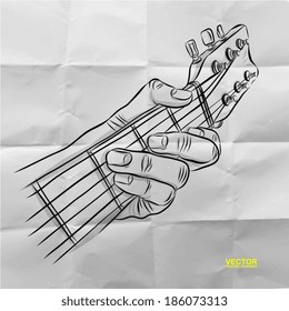 hand drawn of had playing guitar on crumpled paper background 