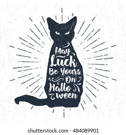 Hand drawn Halloween label with textured black cat vector illustration and "May luck be yours on Halloween" lettering.