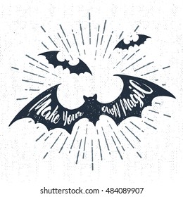 Hand drawn Halloween label with textured bats vector illustration and "Make your own magic" inspirational lettering.