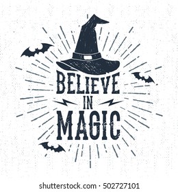 Hand drawn Halloween label with textured witch hat vector illustration and "Believe in magic" lettering.