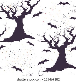 Hand drawn halloween seamless pattern with cartoon spooky tree silhouette with bats.