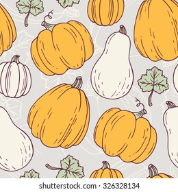 Hand drawn halloween seamless pattern with pumpkins and leaves. Halloween background. Vector illustration