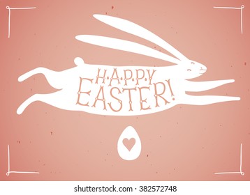 Hand drawn Happy Easter title in rabbit silhouette. Beautiful old style lettering for your design.