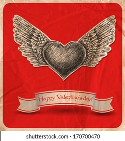 Hand - drawn heart with feather wings and ribbon on red background with old crumpled paper texture, Valentine day card