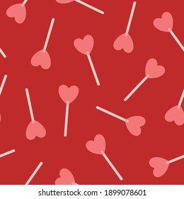 Hand drawn heart lollipop seamless vector pattern. Vintage candy pattern for Valentine’s Day and romantic holidays. Love and romance symbol. Poster, print, card, fabric