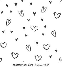 Hand drawn hearts seamless pattern. Love heart doodles texture background.