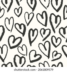 Hand drawn hearts seamless pattern. Cute cartoon stylized simple shapes. Perfect for gift card, wallpaper, wrapping paper and package print, fabric and any surface design. Black and white